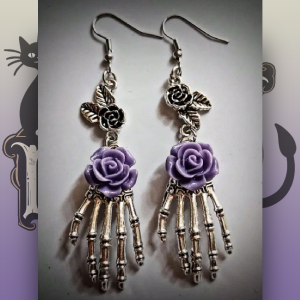Pendientes mano esqueleto Malva Pendientes mano esqueleto Malva